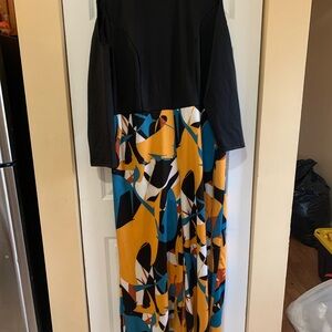 Black and Multicolor Abstract wide leg jump suit with peek a boo shoulders